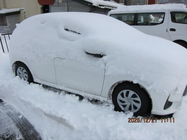 Car covered in snow